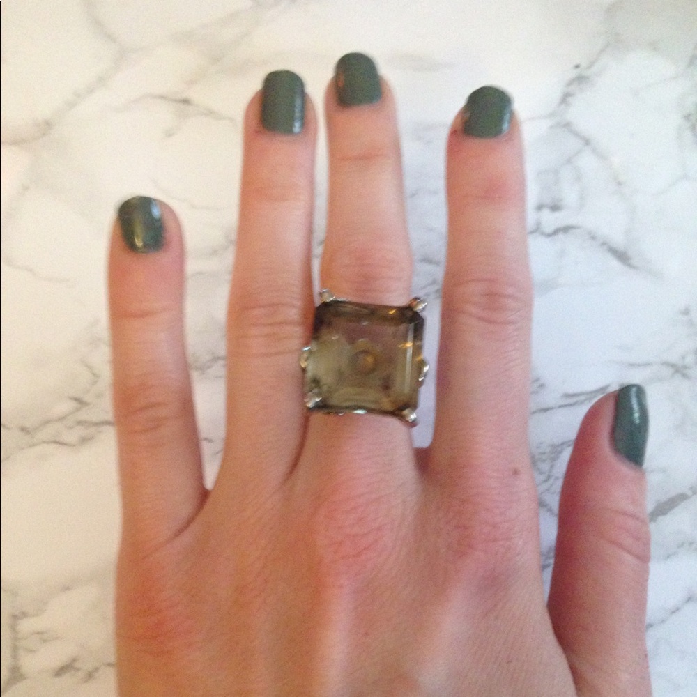 Silver ring with gray stone